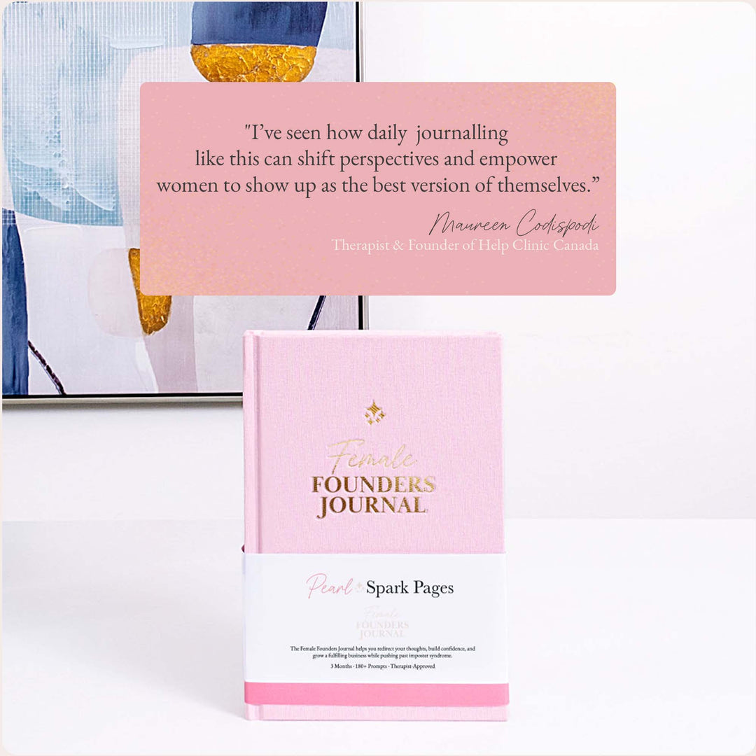 Female Founders Journal by Pearl Spark Pages with visible ‘therapist approved’ badge on the blush pink hardcover.